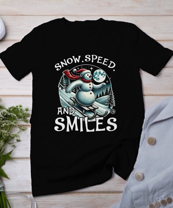 Snow Speed and Smiles T Shirt Vintage Snowman Sledding Graphic Tee Winter Holiday Gift Funny Snowman Shirt Outdoorsy